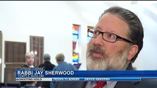 Hundreds gather to support Jewish community, honor shooting victims