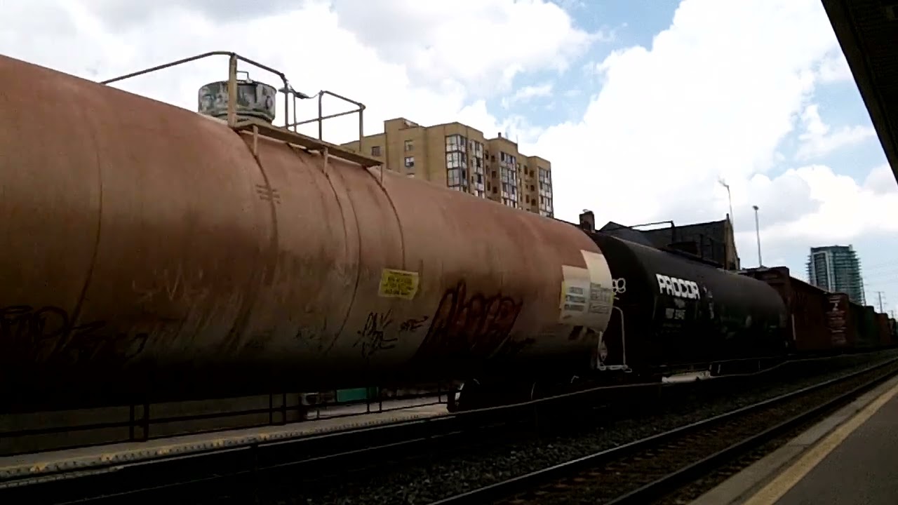 CN 435 w/ CN Engines 5613 & 2659 lead this WB Mixed/Autorack train by Brampton GO/VIA Station