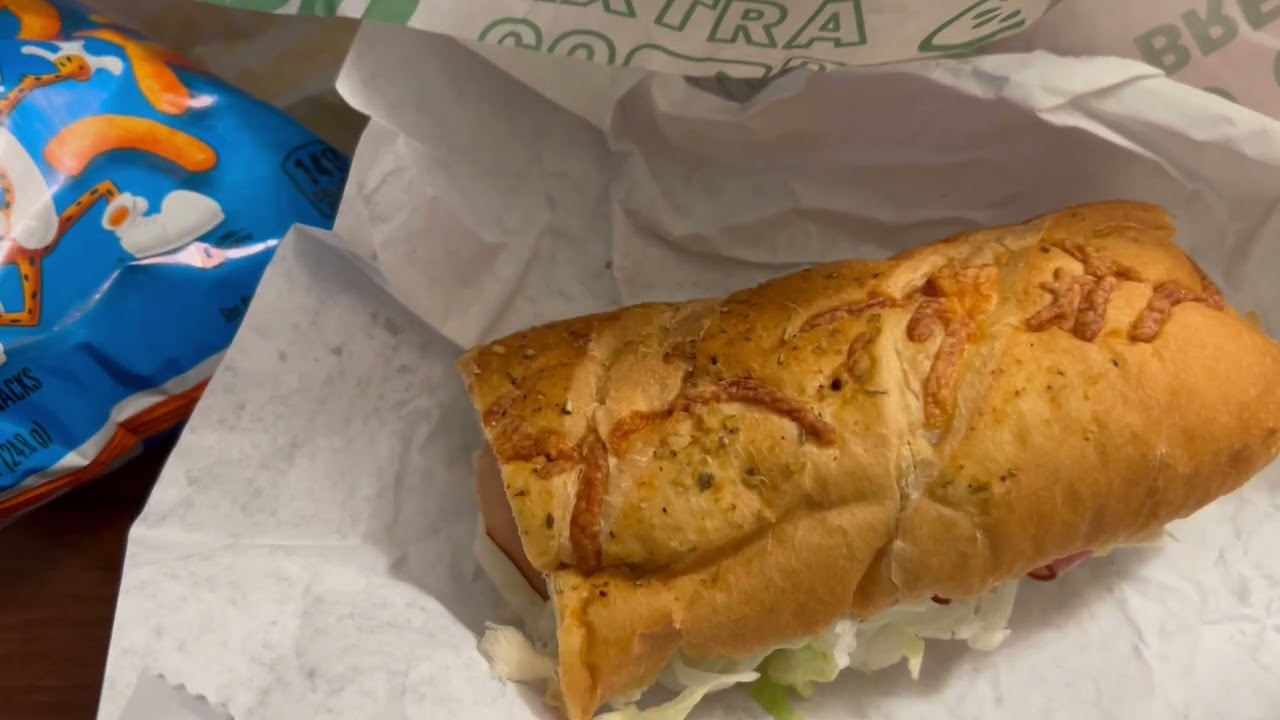 Eating Subway sandwich and hotel room tour