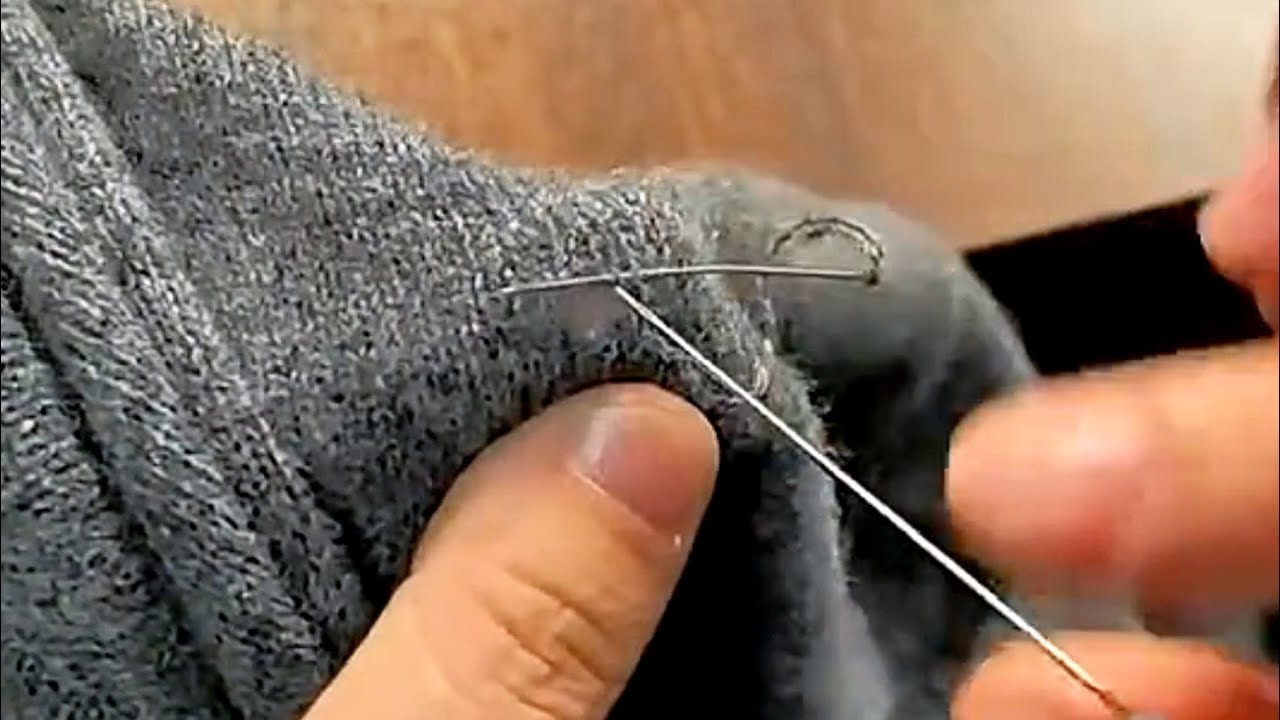How to repair holes in a knitted sweater