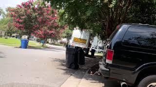 City of Virginia Beach Virginia trash truck knocking over trash cans