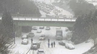 Raleigh cleans up gridlock after winter storm
