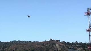 Robinson R22 Helicopter taking off from Torrance Airport