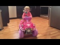 Addie riding her Minnie quad!