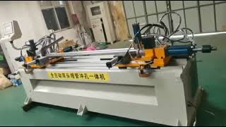 autoloading and unloading twin head end forming machine integrated with hole punching function