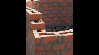 Brick wall construction with rat-trap bond