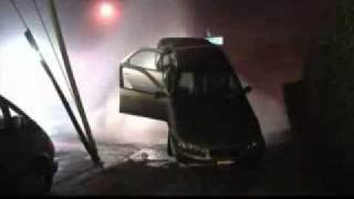 Woman driver vs firehydrant FAIL 2011