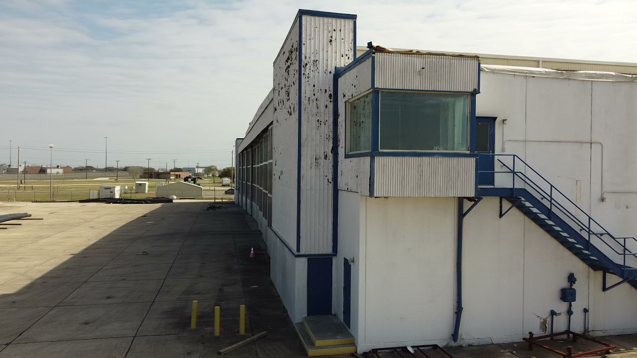 Facility Support:  Hangar - Industrial Paint Before