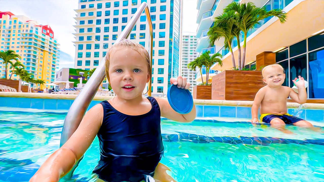 Little Naomi is spending her time in the pool with her baby brother