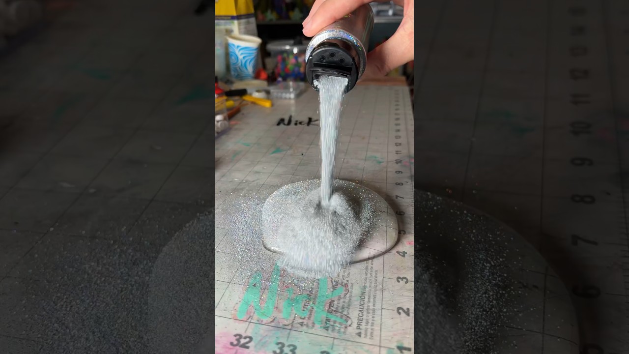 Mixing micro holographic glitter into slime ✨