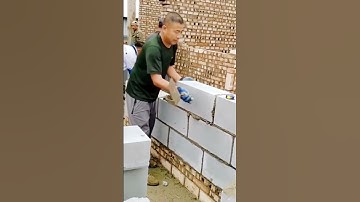 the process of installing bricks for house walls #shorts
