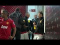 Usain Bolt meeting the Manchester United squad in the Old Trafford tunnel