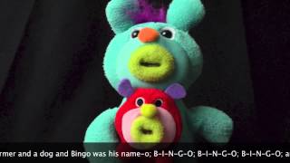 Sea Green With Red Puppy Baby Sing-A-Ma-Jig Duets Sings Bingo.