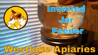 This is an inverted jar feeder for beekeeping. After it is filled I simply place it over a hole in the hive lid. I use them mostly for nucs. 