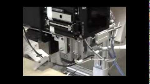 Labeling System Printing And Applying Very Small Labels To  Very Small Parts