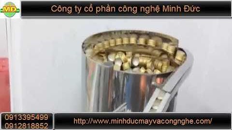 Máy chiết rót, xoáy nắp chai chính xác Minh Đức