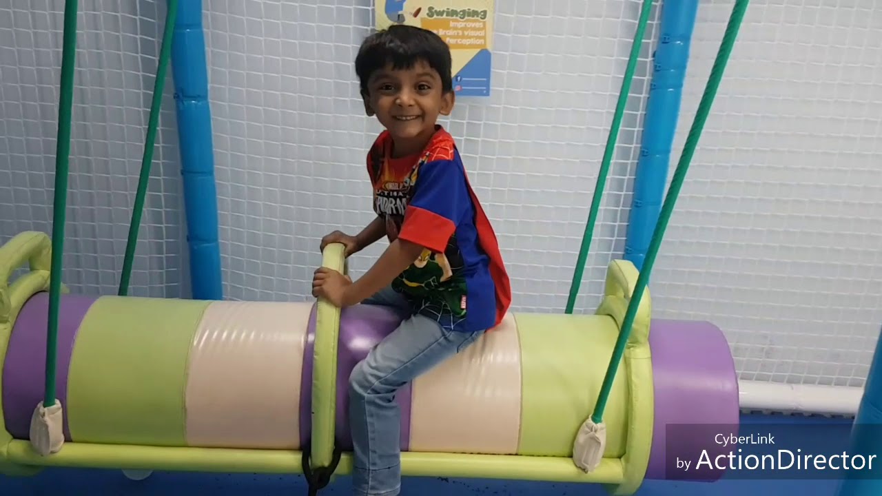 Maaksharth was playing with swings, inorbit mall, indoor play area
