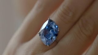 Rare 'Blue Moon' diamond sells for record $48 million at auction