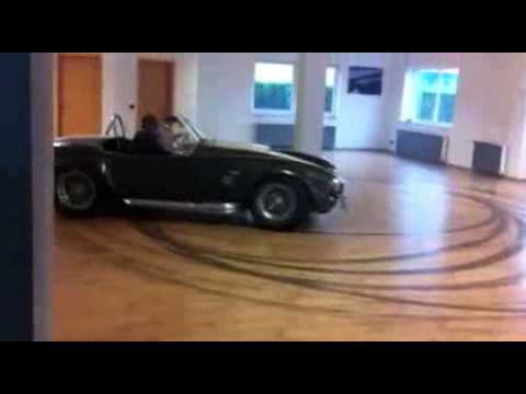 Shelby Cobra Doing Donuts In A Living Room