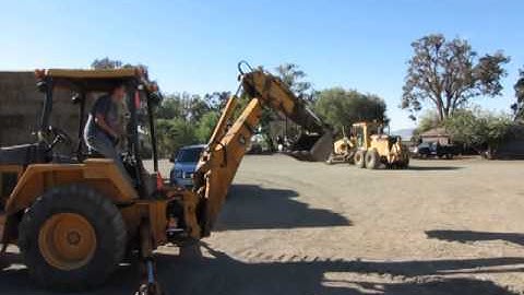 Lot #0104: John Deere 410B Extend-A-Hoe Video One