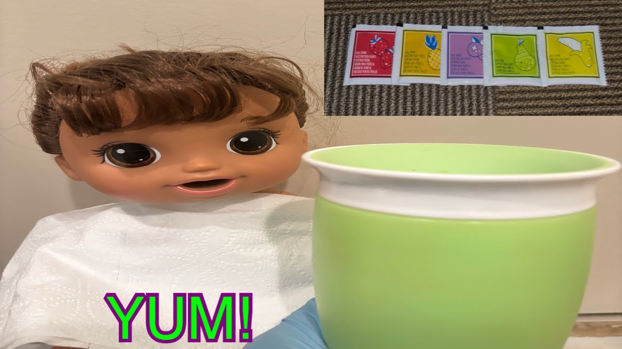 Feeding Magical Mixer Brunette a breakfast smoothie