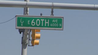 86-year-old woman shot while sitting her in vehicle