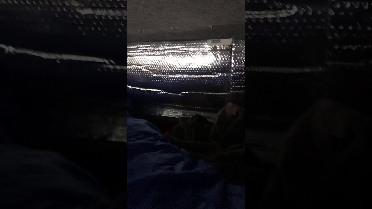 6 feet tall, sleeping in a 5 foot truck bed