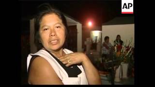 Mexicans pay respects to their dead at cemeteries on All Souls' Day