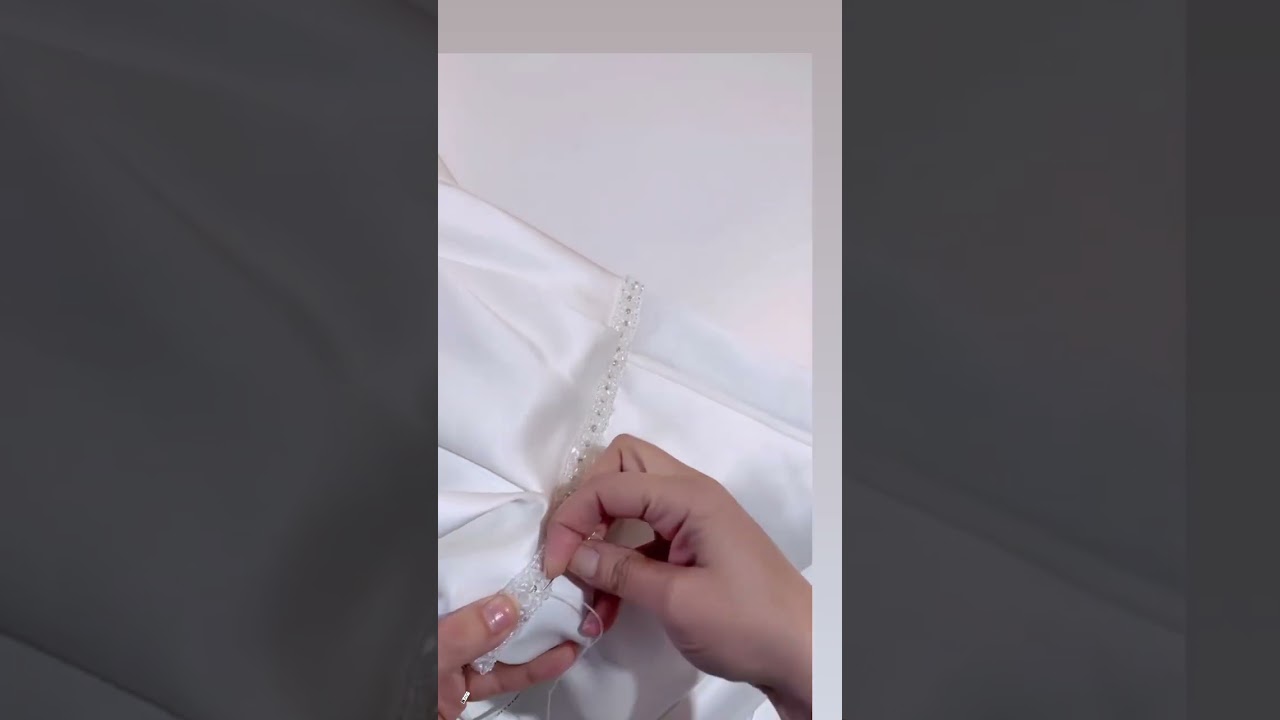 Adding sequins belt to wedding dress. 