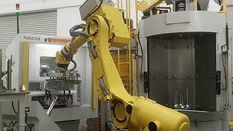 Rotary Table Shot Blast Machine With Robotic Arm Automatic Unloading And Loading