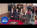 Michael Douglas receives star with his father Kirk by his side