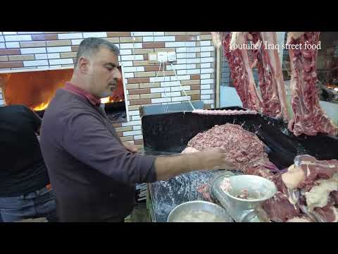 Iraqi food making kebabs from lamb in the streets of Iraq