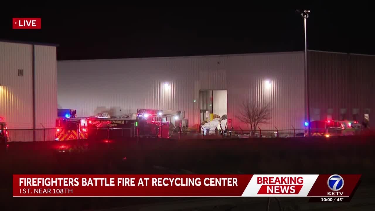 Omaha firefighters battle fire at recycling center - YouTube
