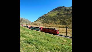 Glacier Express at Oberalp Pass in Swiss Alps, Matterhorn Gotthard Bahn