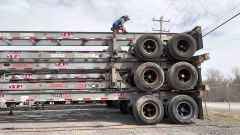 Watch mae climbing on the 5 stack chassis to help chain them down