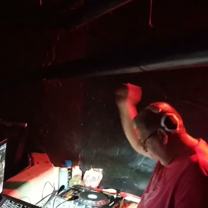 Dj Ciro Llerena mixing at The Open Stage Club in Miami Fl