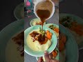 Mashed potatoes with chops and veggies and gravy