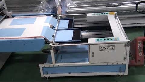 Automated Material Stacker for Efficient Fabric Fusing Operations