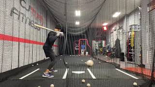 Quentin Holmes working off 100mph pitching  machine