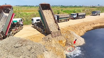 Impressive Bulldozer Skill Driver Pushing Soil Drop Into Water With Team Work Dump Trucks Unloading
