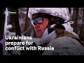 Ukraine: Civilians prepare for combat as Russia and Nato hold make or break talks