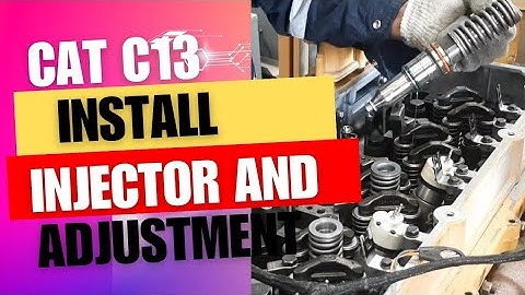 Install injector and valve lash adjustment. caterpillar C13