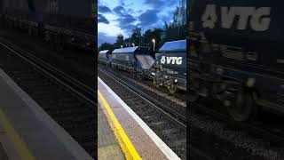 Class 66 Freightliner passing Kensington Olympia.
