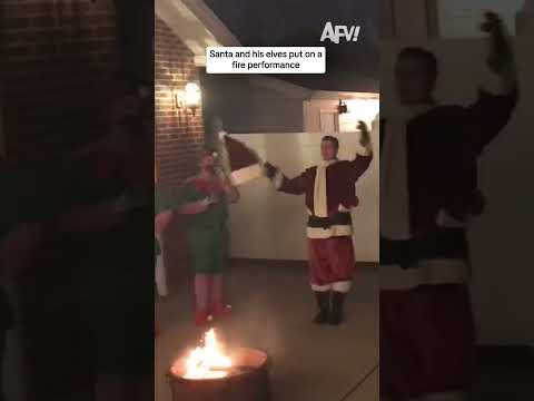 Santa and his elves put on a fire performance