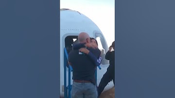 Lauren Sanchez hugs Jeff Bezos after return from space