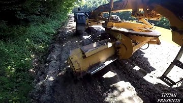 Motor Grader Grading The Road-Skilled Operator