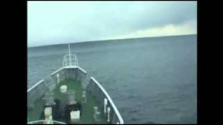 Japanese ship goes over a giant Tsunami wave