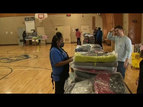 Amazon donates and delivers hundreds of coats to Pontiac elementary school