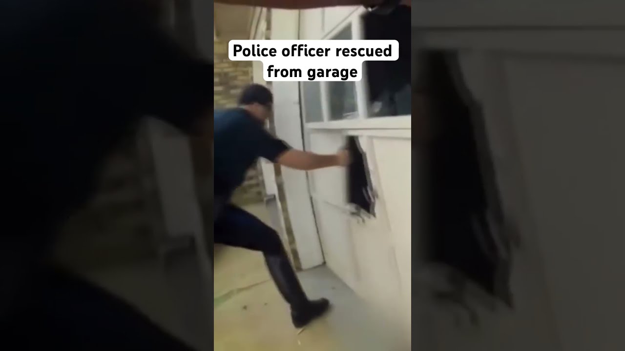 Bodycam Shows Police Rescue Officer From Garage