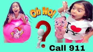 Angelina and mami making exercise and playing with a giant pick ball.